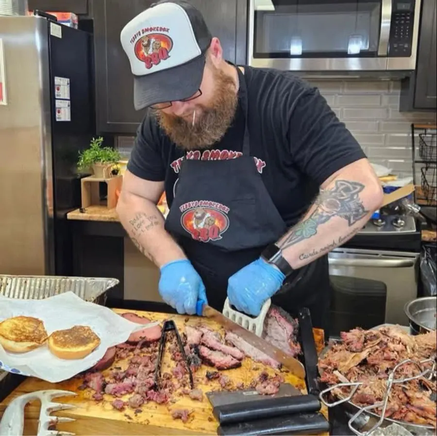 Pitmaster Rodney Tedford Slicing Brisket
